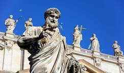 Statue of Saint Peter holding a key on St. Peter's Square in